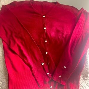 Basic burgundy cardigan with pretty mother of pearl buttons. Size medium.